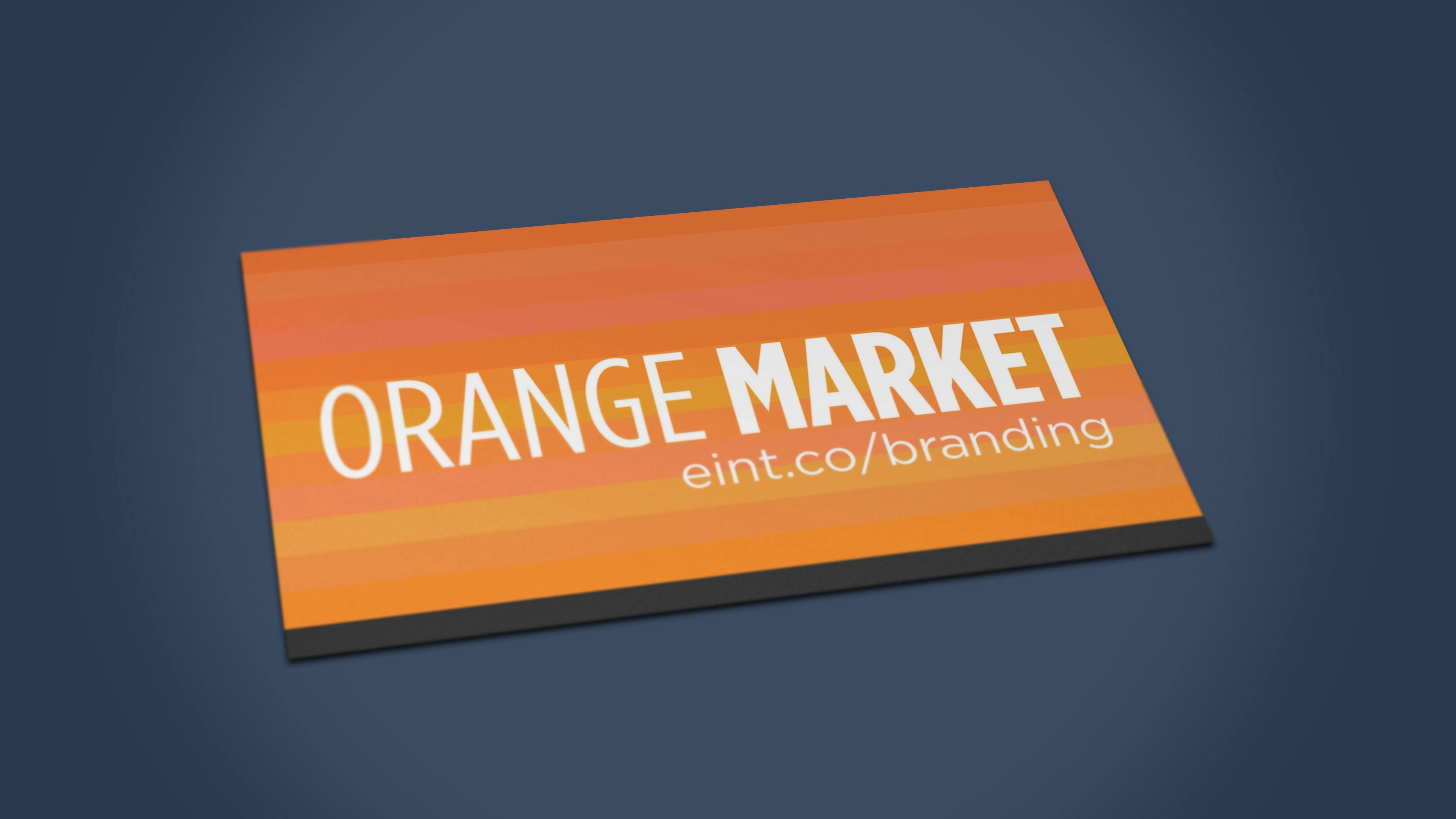 Picture of the Orange Market business card that had stripes of different shades of orange